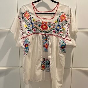 Beautifully handmade cotton blouse. Hand embroidered. Gorgeous decoration.